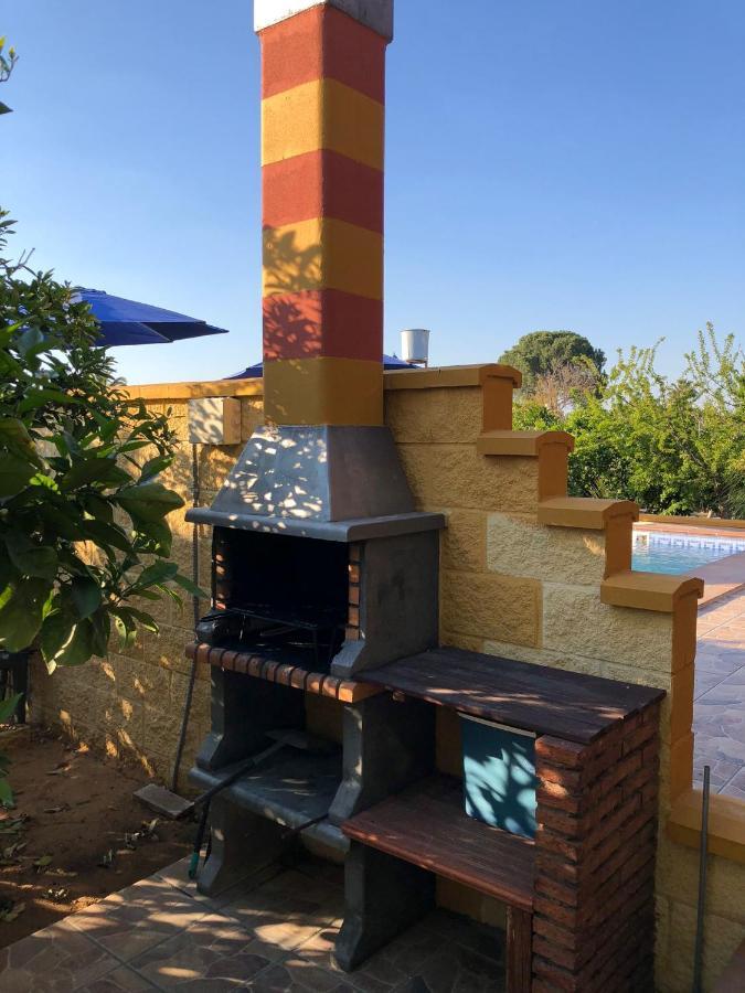 セビリア Casa De Madera El Oasis El Palomarヴィラ エクステリア 写真